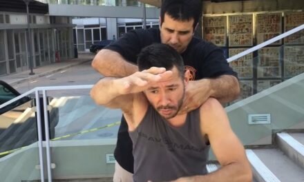 Defense against choke from behind with a push demonstration