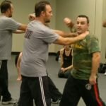 Defense against front choke with a push demonstration