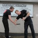 Defending a knife attack from the side